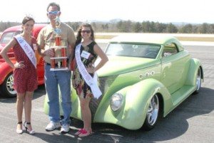 Miss Pickens County Kendyl Chapman and Miss Pickens County Teen Allison Hale pictured with Eddie White, who won “Best in Show” with his 1937 Ford Wild Rod 3-w Roadster.