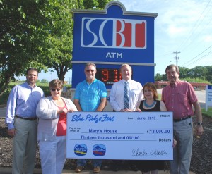 Mary’s House — Representatives of Blue Ridge Fest, the annual classic car cruise-in event hosted by Blue Ridge Electric Cooperative Inc. and Blue Ridge Security, were joined by representatives from Bearden Landscaping and South Carolina Bank & Trust, Blue Ridge Fest sponsors, to present a check for $13,000 to Mary’s House. Pictured, from left, are Dusty Reeves, Sales Manager, Blue Ridge Security Inc.; Denise McCormick, Manager of Customer Service and Marketing, Blue Ridge Electric Cooperative Inc.; Tommy Bearden, Bearden Landscaping; Ryan Jones, Assistant Branch Manager, South Carolina Bank & Trust; Lisa Smith Cope, Executive Director, Mary’s House; and Chris Koth, Board Treasurer, Mary’s House.