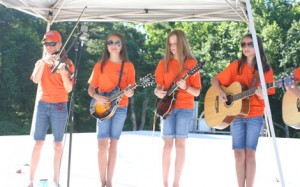 Members of the Young Appalachian Musicians program, seen here at the dedication ceremony for the city of Pickens’ new amphitheater last weekend, owe a debt of gratitude to bluegrass pioneers such as Aunt Samantha Bumgarner.