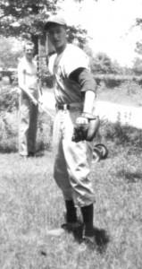 Courtesy Jack Hester Jack Hester poses for a photo with a ball and glove during his younger days, when he was an avid baseball player.