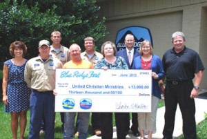 United Christian Ministries — Representatives of Blue Ridge Fest were joined by representatives from Henry D. Nix Co. and Cornell Dubilier, sponsors of Blue Ridge Fest, to present a check for $13,000 to United Christian Ministries. Pictured, from left, are Michelle Watson, Blue Ridge Electric Cooperative Inc.; Anson Perry, Blue Ridge Electric Cooperative Inc.; Kevin Lewis, Blue Ridge Electric Cooperative Inc.; Damion Ownens, Blue Ridge Electric Cooperative Inc.; Alan Blackmon, Blue Ridge Electric Cooperative Inc; Dewan Nix, Henry D. Nix Co.; Judy Gillespie, Cornell Dubilier; Pat Case, Assistant Director, United Christian Ministries; and Bryan Hester, board member, United Christian Ministries. 