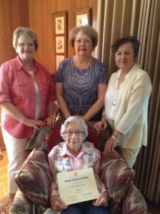 Nancy Johnson has recently been awarded her 60-year membership certificate by the Daughters of the American Revolution. Johnson became a member of DAR in 1953. She will celebrate her 100th birthday on Sept. 22. Pictured are Harriet Nash, Carolyn Patterson and Lynda Abegg presenting the DAR 60-year membership award to Johnson.