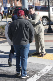 Rocky Nimmons/Courier Pickens County sheriff Rick Clark greets community members during an event in honor of Martin Luther King Jr. Day on Monday in Pickens.