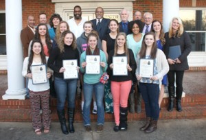 Mayor David Owens and the Pickens City Council took a moment to honor the 2014 Pickens High School State Championship volleyball team during the regular monthly meeting on Monday. The team, along with coaches and trainers, were given the 2014 “We Fan the Flame” Community Pride Award. Team members and head coach Jennifer Gravely are pictured with Owens and members of city council on Monday.
