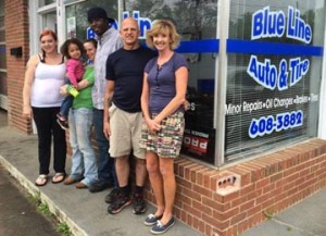 Steve Lorch/Courier “We want to take the fear out of going to the mechanic,” said Blue Line Auto & Tire owner Robert Sapp, second from right, pictured with the Blue Line family.