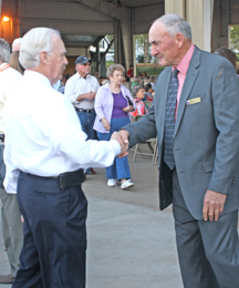 Blue Ridge Electric Cooperative president and CEO Charles Dalton, left, greets director Mendel Stone of Oconee County at last week’s annual members meeting.