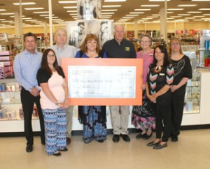 As a part of Goody’s "30 days of giving" program, the employees of the Pickens Goody’s store collected money from their customers to support Feed A Hungry Child Pickens County. On Thursday, employees got the chance to present a check for $600 to FAHCPC chairman Milledge Cassell. Pictured are Goody’s regional vice president Howard Wright, sales associate Jessica Lowe, Goody’s district vice president Don Stanley, store manager Tracey James, Cassell, sales associate Jennie Cassell, sales associate Julie Gorgone and assistant store manager Amanda Riddle. 