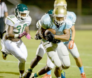 Carl Ackerman/Photo Daniel High School's Dante Gilliard runs after a catch against Berea during the Foothills FCA Jamboree on Saturday in Central.