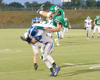 Tommy McGaha/Courier Pickens’ Jamal Blythe upends Easley’s during their game Friday night at Green Wave Stadium.