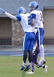 Tommy McGaha/seeyourphotohere.com Pickens’ Kirkland Gillespie, left, and Isaiah Ferguson celebrate after Ferguson scored a first-quarter touchdown against Walhalla on Friday night.