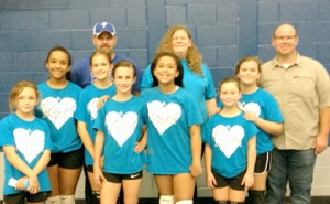 12U Champions — Back: Coach Zander Clarkson, Maggie Cisson and Coach Jamie Duncan. Front: Allison Moore, Destanie Abney, Faith Clarkson, Bre Barksdale, Tensley Gowans, Jenny Lyda and Anna Duncan.