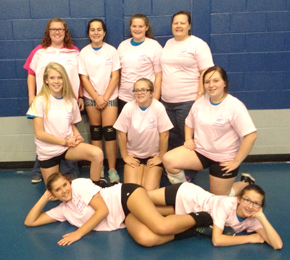 14U Champions — Standing: Asst. Coach Kayla Underwood, Maddy Butler, Bailey Keasler and Coach Bettina Keasler. Middle: Allison Bradley, Taylor Rackley and Megan Wyatt. Laying down: Cheree Roscoe and Karen Kay.