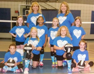 9U Champions — Standing: Back Row Coaches Dianna Morris and Angie Durham. Standing: Kadence Arnold, Ava Harrington, Gracie Williams and Kenzie Garren. Kneeling: Anna Claire Durham and Sadie McKinney. Sitting: Holly Lee and Ivy Freeman.