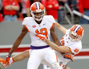 Rex Brown/Courtesy The Journal Clemson’s Charone Peake and Hunter Renfrow celebrate after a touchdown during the Tigers’ win over N.C. State on Saturday in Raleigh, N.C.