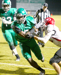 Easley's Derrick Phillips runs past a Greenville defender during their game on Friday night.