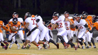 Brandy Karr/Photo Liberty’s Tyler Renaud carries the ball during the Devils’ season-ending win over Carolina on Oct. 30. Renaud led Liberty with 741 yards on the ground in 2015.