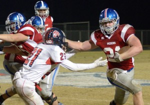 Tommy McGaha/seeyourphotohere.com Pickens’ Gunner Covey stiff-arms a Belton-Honea Path defender during their game Friday night.