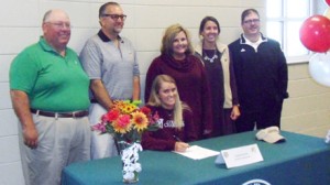 Easley High School senior Savannah Goodman is pictured with former coach Dave Giffin, her father, Scott, sister, Kalie, mother, Susan, and current coach David Beddingfield as she signs with the College of Charleston last week. 
