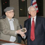 Henderson, and Dalton pressing the button to light the tree