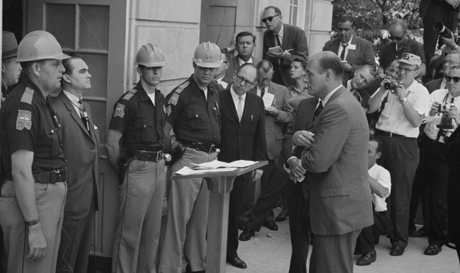 Alabama Gov. George Wallace stands defiant outside the doors of the University of Alabama to protest integration in the 1950s. Courtesy Photo