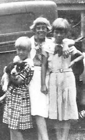 Grace Moody, center, with sisters Maxine, left, and Lucy, right, as caretakers of the Lupton Estate