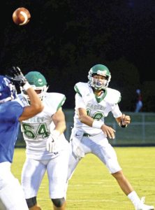 Kerry Gilstrap/Courier Easley sophomore quarterback Weston Black launches a pass against Pickens in the Green Wave’s 14-0 season-opening win on Friday night at Blue Flame Stadium.