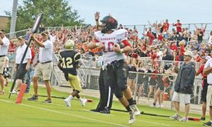 Brandy Karr/Photo The visiting stands go wild after Seth Dover’s second-quarter touchdown catch from Nick Reeves in Liberty’s win at Pendleton on Friday night. The touchdown and Austin Kemp’s extra point proved to be enough in the 7-6 victory.